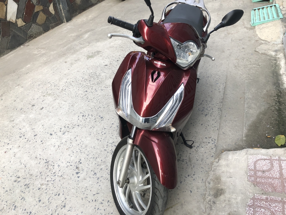Em cần bán xe máy Honda SH125i 2015 màu đỏ mận