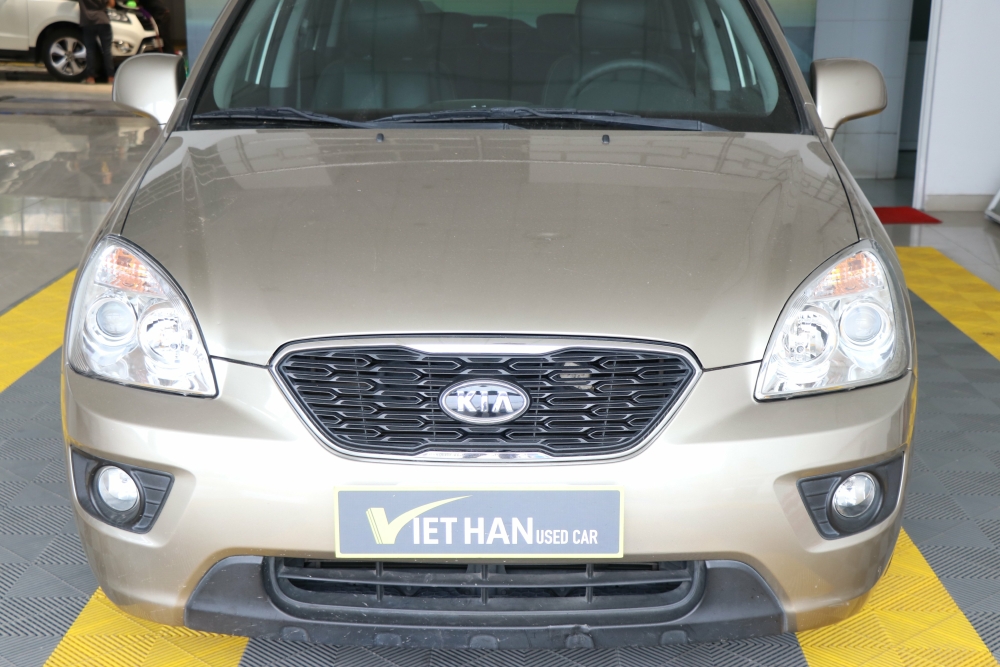 Bán Kia Carens EX 2.0MT màu vàng cát số sàn sản xuất 2015 biển Sài Gòn đi 38000km