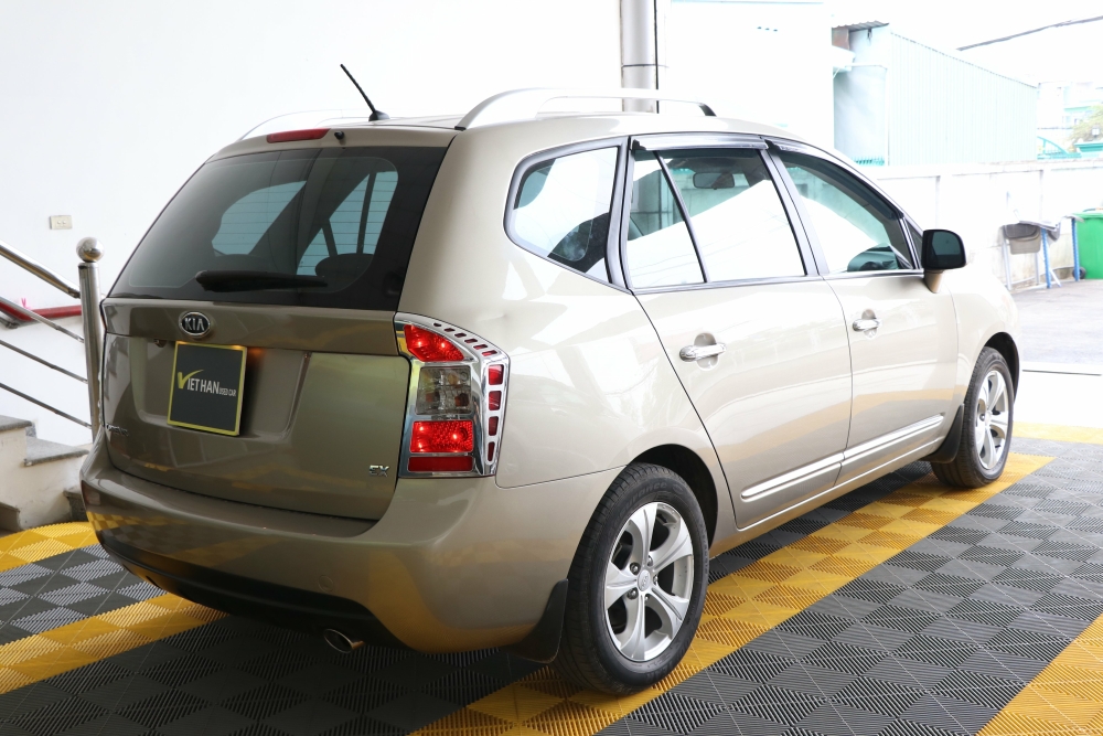 Bán Kia Carens EX 2.0MT màu vàng cát số sàn sản xuất 2015 biển Sài Gòn đi 38000km