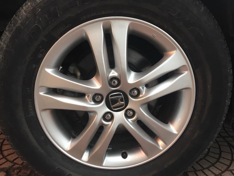 Gia đình đổi xe cần bán Crv, số tự động, sản xuất 2011, bản 2.4 full, màu bạc