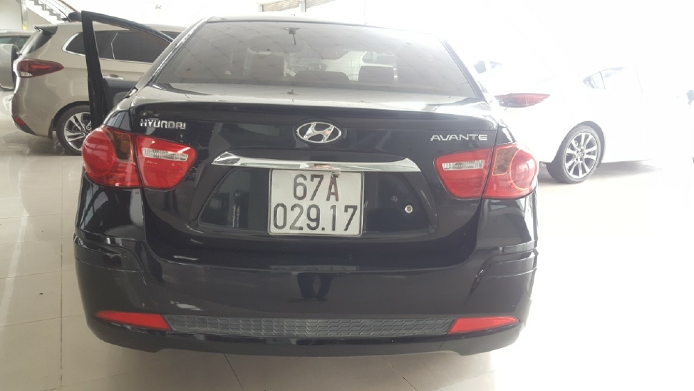 Bán Hyundai Avante 1.6MT màu đen VIP số sàn sản xuất 2014 một chủ đi 78000km