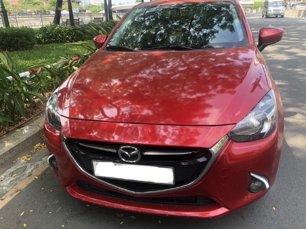 Bán Mazda 2 2016, màu đỏ, đúng chất, giá TL, hổ trợ góp