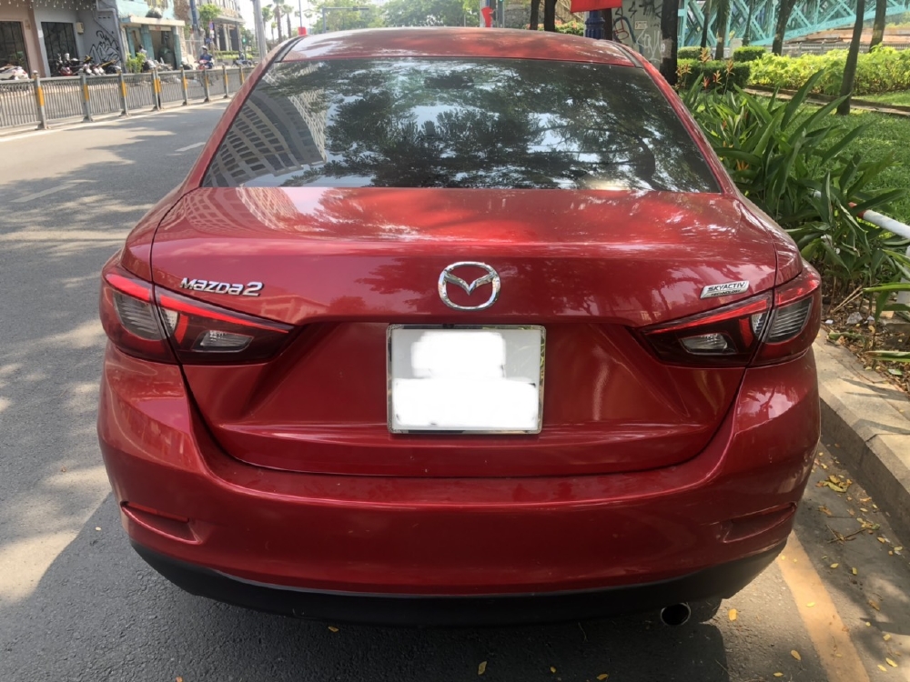 Bán Mazda 2 2016, màu đỏ, đúng chất, giá TL, hổ trợ góp