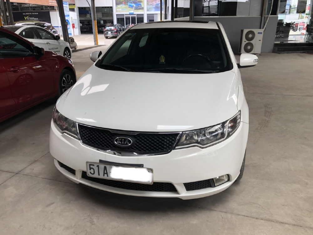 Bán Kia Forte SX 1.6AT 2010, màu trắng, đúng chất, biển TP, giá TL
