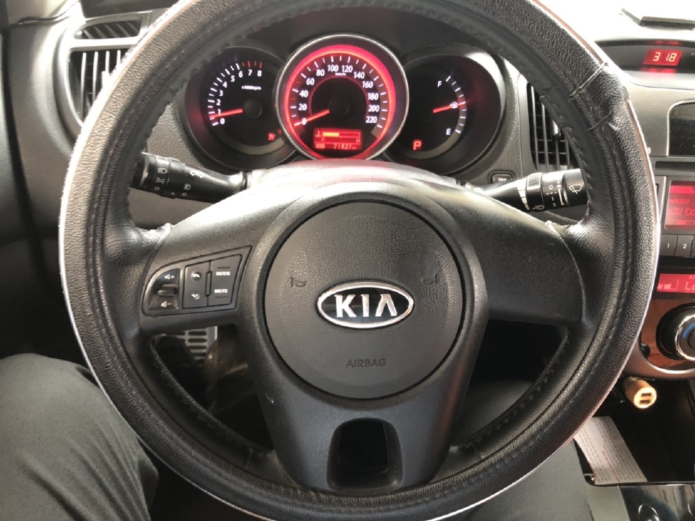 Bán Kia Forte SX 1.6AT 2010, màu trắng, đúng chất, biển TP, giá TL