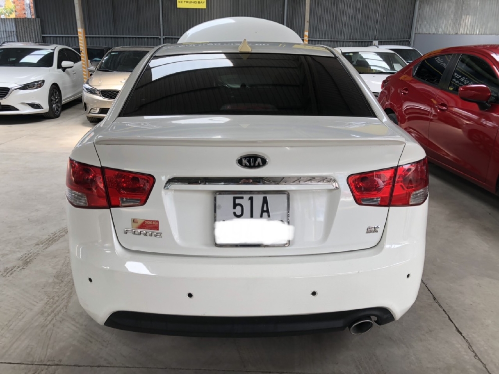 Bán Kia Forte SX 1.6AT 2010, màu trắng, đúng chất, biển TP, giá TL