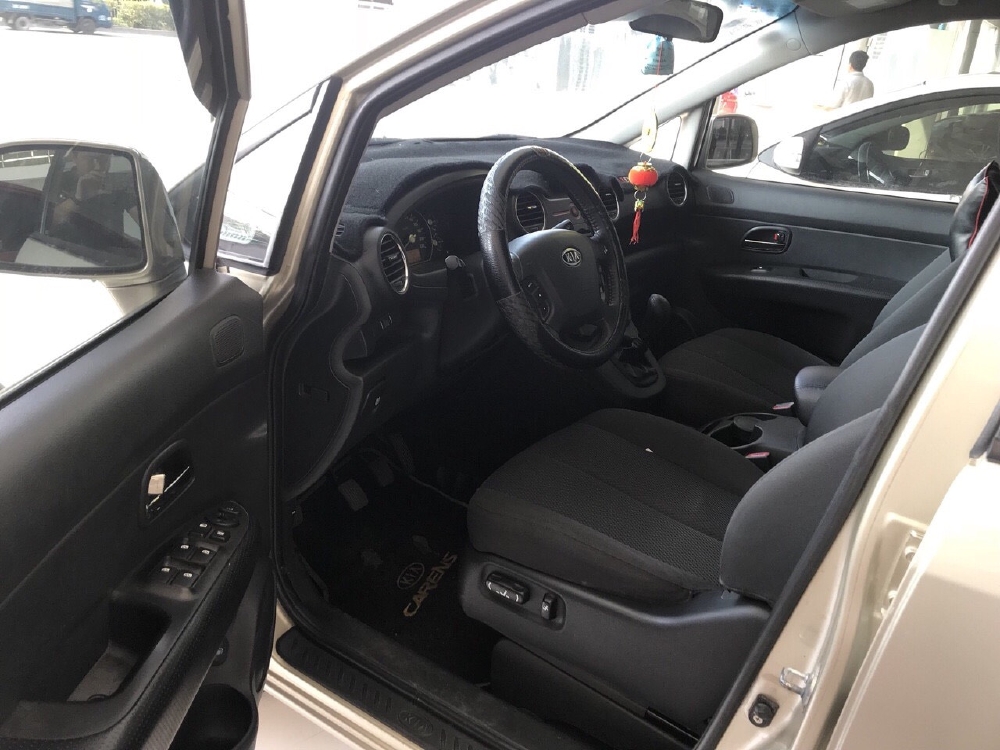 Bán Kia Carens SX 2.0MT màu vàng cát số sàn sản xuất 2012 biển Sài Gòn bản đủ