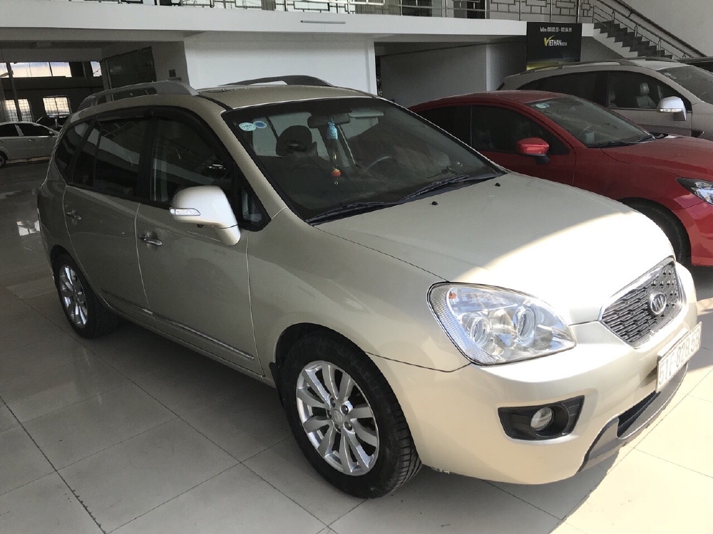 Bán Kia Carens SX 2.0MT màu vàng cát số sàn sản xuất 2012 biển Sài Gòn bản đủ