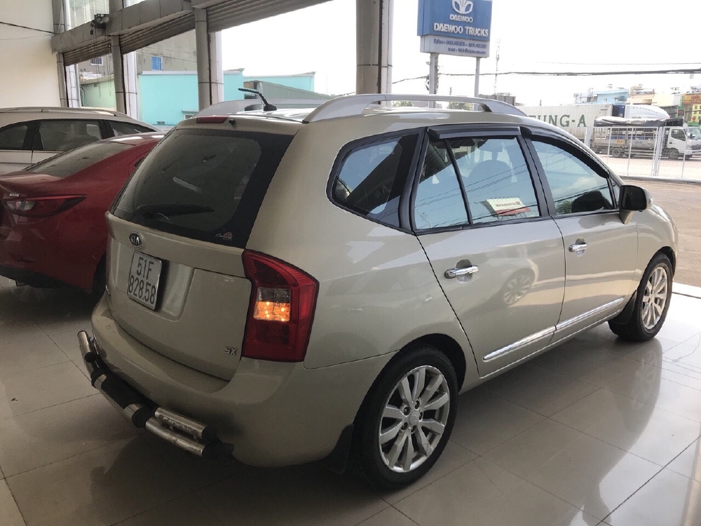 Bán Kia Carens SX 2.0MT màu vàng cát số sàn sản xuất 2012 biển Sài Gòn bản đủ