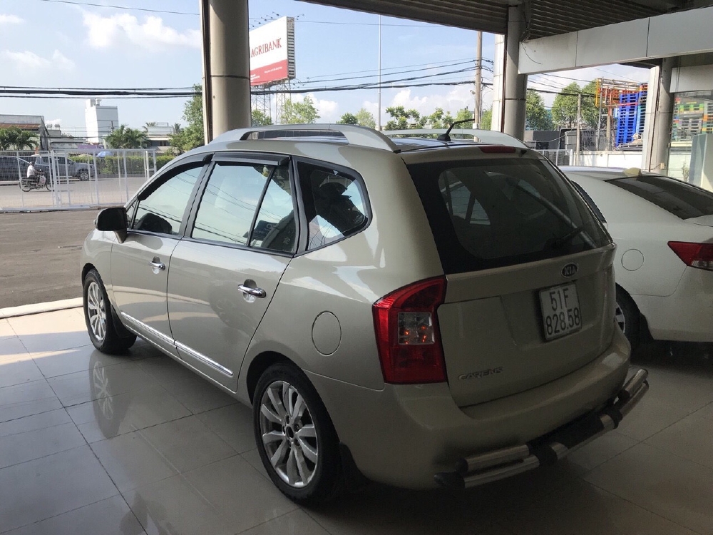 Bán Kia Carens SX 2.0MT màu vàng cát số sàn sản xuất 2012 biển Sài Gòn bản đủ