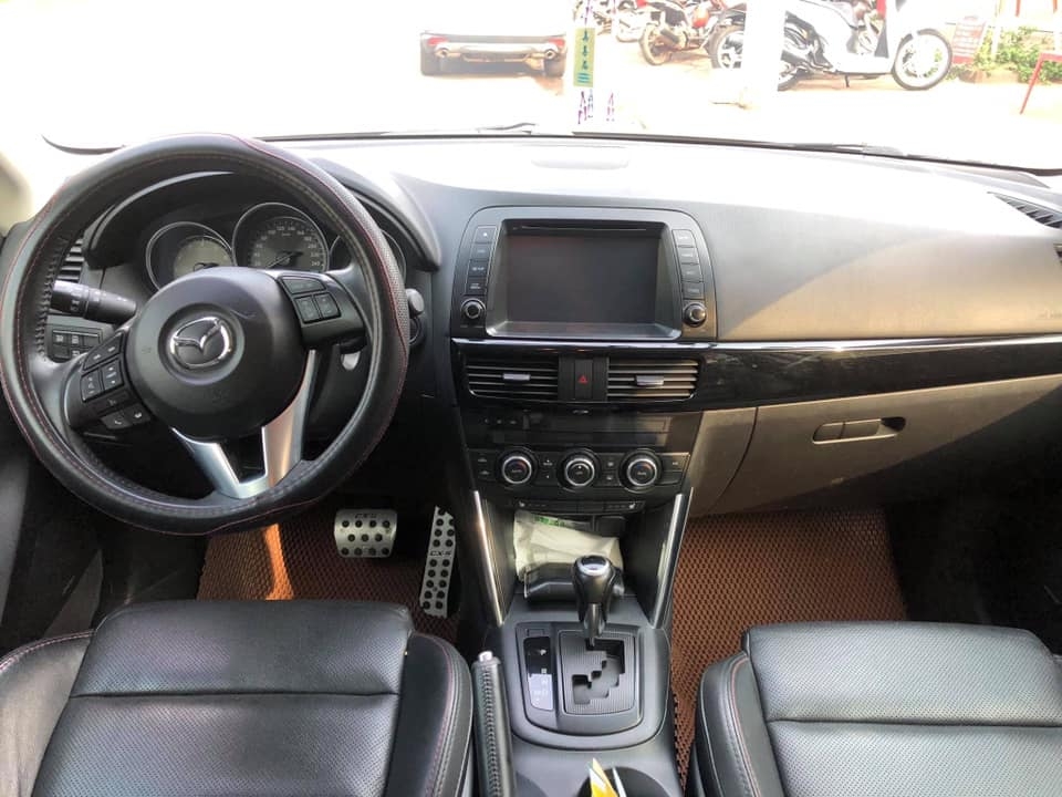 Cần bán xe Mazda Cx5 đời 2015 bản 2.5L full option màu bạc rất keng, xe gia đình trùm mền ít sử dụng
