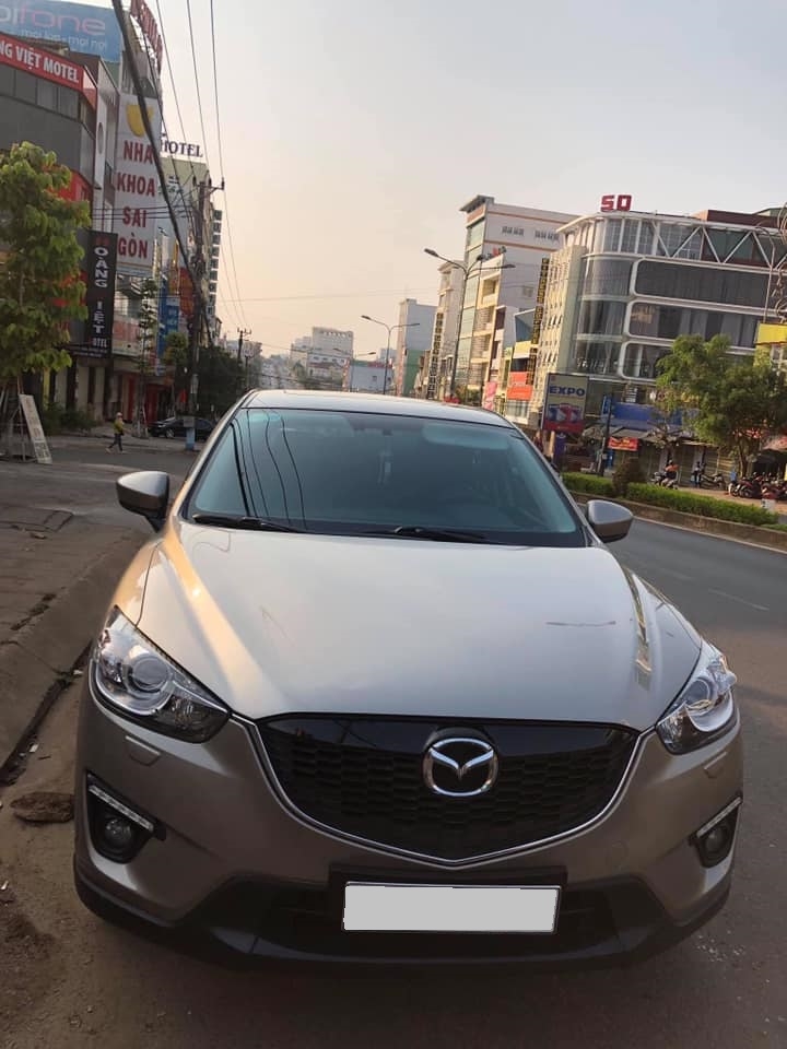 Cần bán xe Mazda Cx5 đời 2015 bản 2.5L full option màu bạc rất keng, xe gia đình trùm mền ít sử dụng