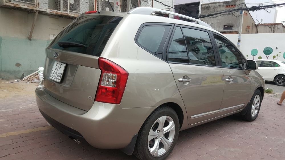 Bán Kia Carens EX 2.0MT màu vàng cát số sàn sản xuất 2016 biển Sài Gòn 1 chủ