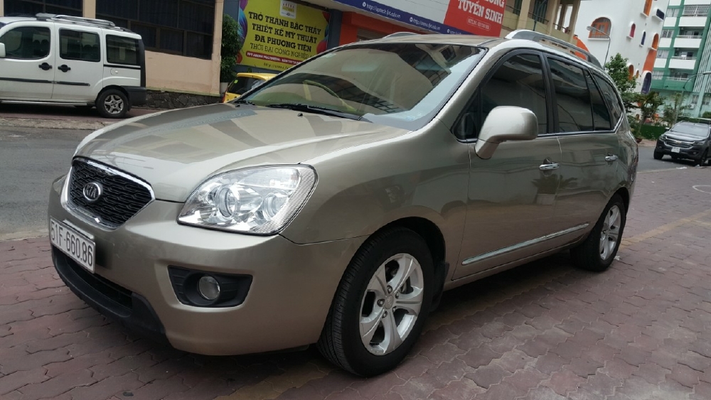 Bán Kia Carens EX 2.0MT màu vàng cát số sàn sản xuất 2016 biển Sài Gòn 1 chủ