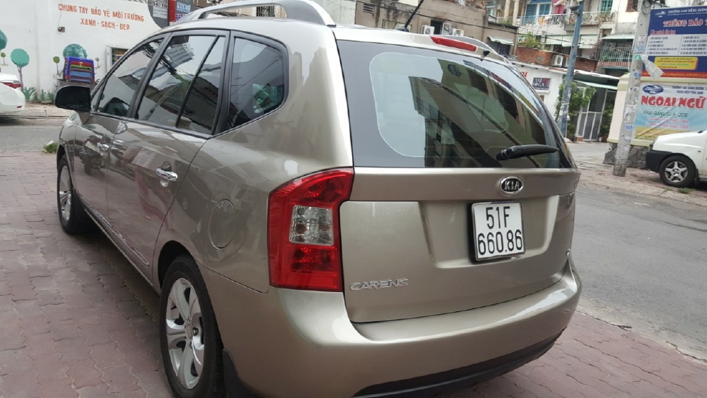 Bán Kia Carens EX 2.0MT màu vàng cát số sàn sản xuất 2016 biển Sài Gòn 1 chủ