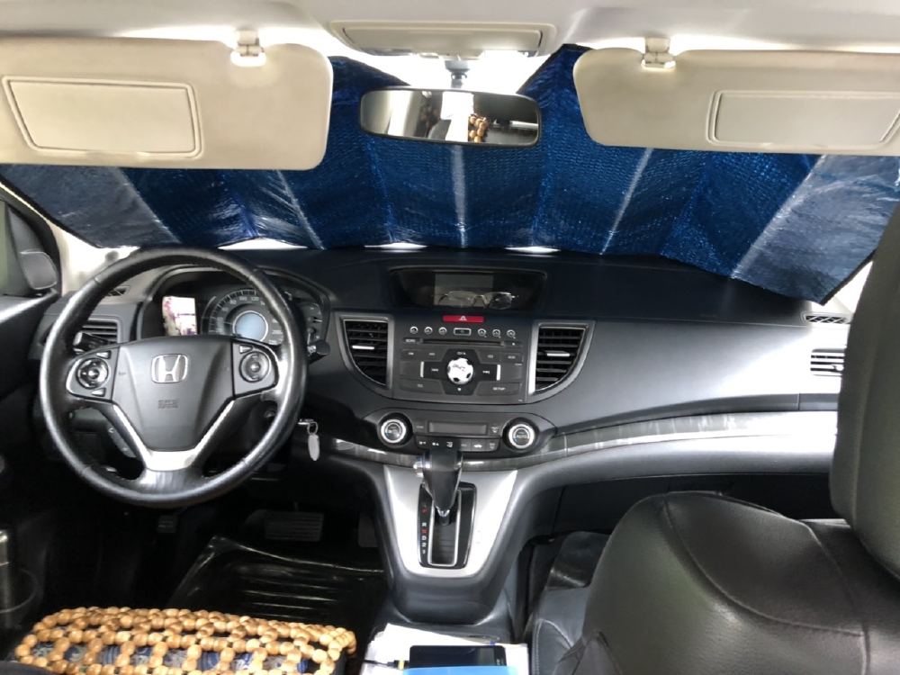 Bán Honda CRV 2.4AT màu bạc sản xuất 2014 biển Sài Gòn một chủ đi 65000km