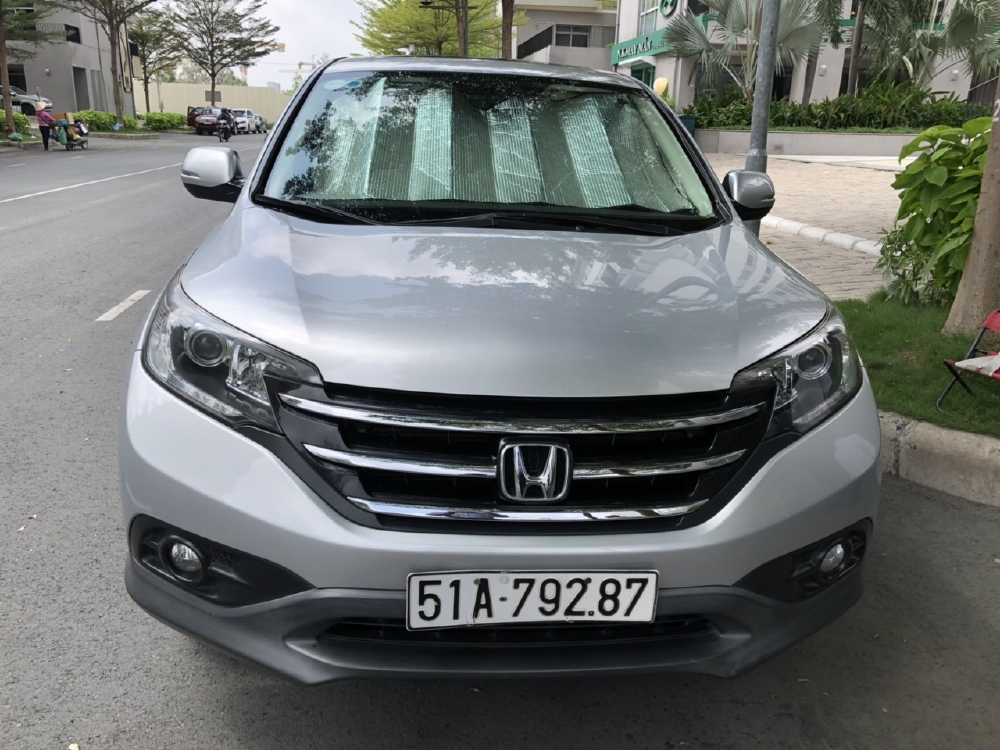 Bán Honda CRV 2.4AT màu bạc sản xuất 2014 biển Sài Gòn một chủ đi 65000km
