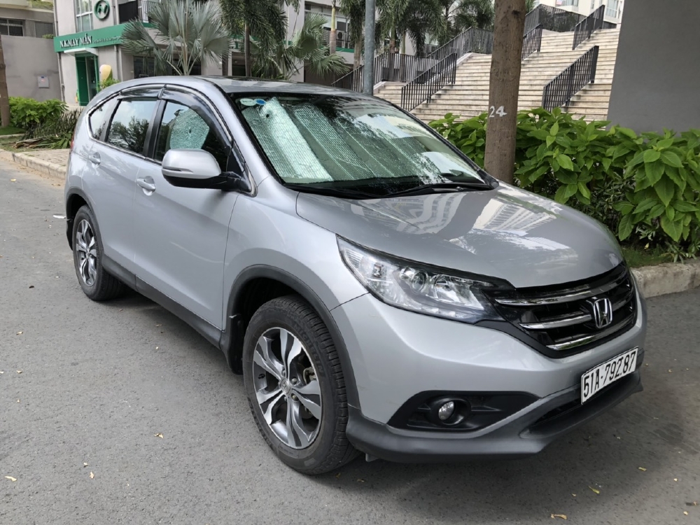 Bán Honda CRV 2.4AT màu bạc sản xuất 2014 biển Sài Gòn một chủ đi 65000km