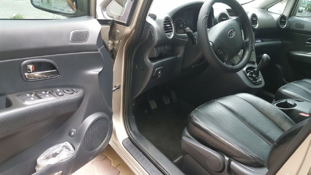 Bán Kia Carens EX 2.0MT màu vàng cát số sàn sản xuất 2016 biển Sài Gòn 1 chủ