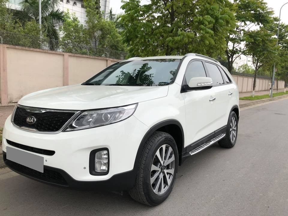 Bán Kia Sorento 2016 màu trắng tự động full đầy đủ tiện nghi.