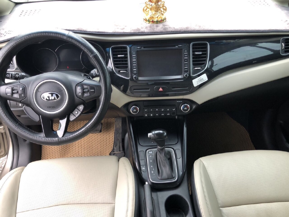 Kia Rondo Gath 2.0AT 2016 màu vàng cát