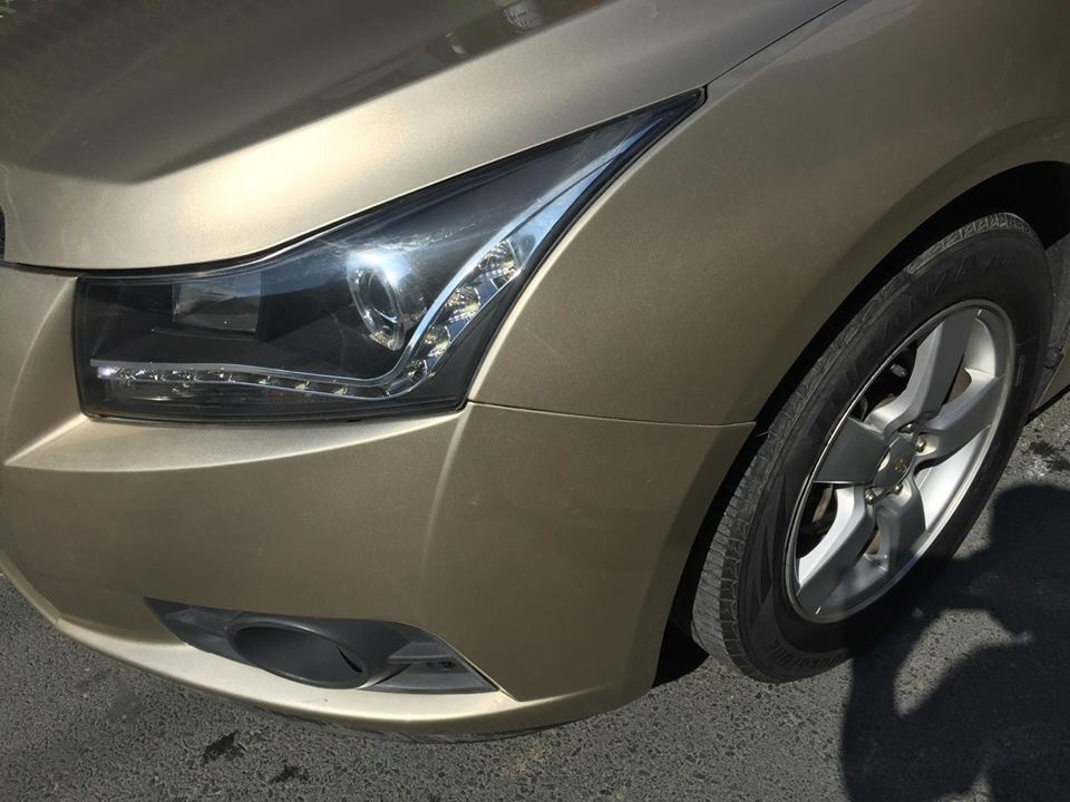 Bán Chevrolet Cruze LS 2011 số sàn màu vàng gia đình chính chủ.