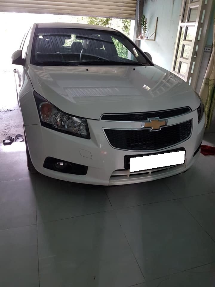 Gia đình cần bán xe Cruze 2013 Ltz, số tự động, màu trắng gia đình sử dụng rất kỷ và rất ít