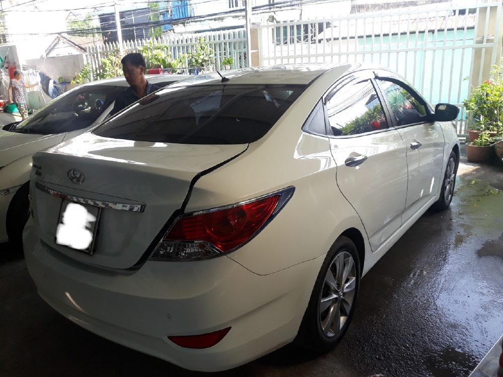 Bán Accent 1.4AT sedan 2014, màu trắng, đúng chất, giá TL, hổ trợ góp