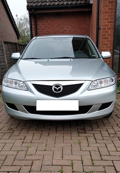 Cần bán xe Mazda 6 số sàn đời 2004 đk 2005 màu bạc