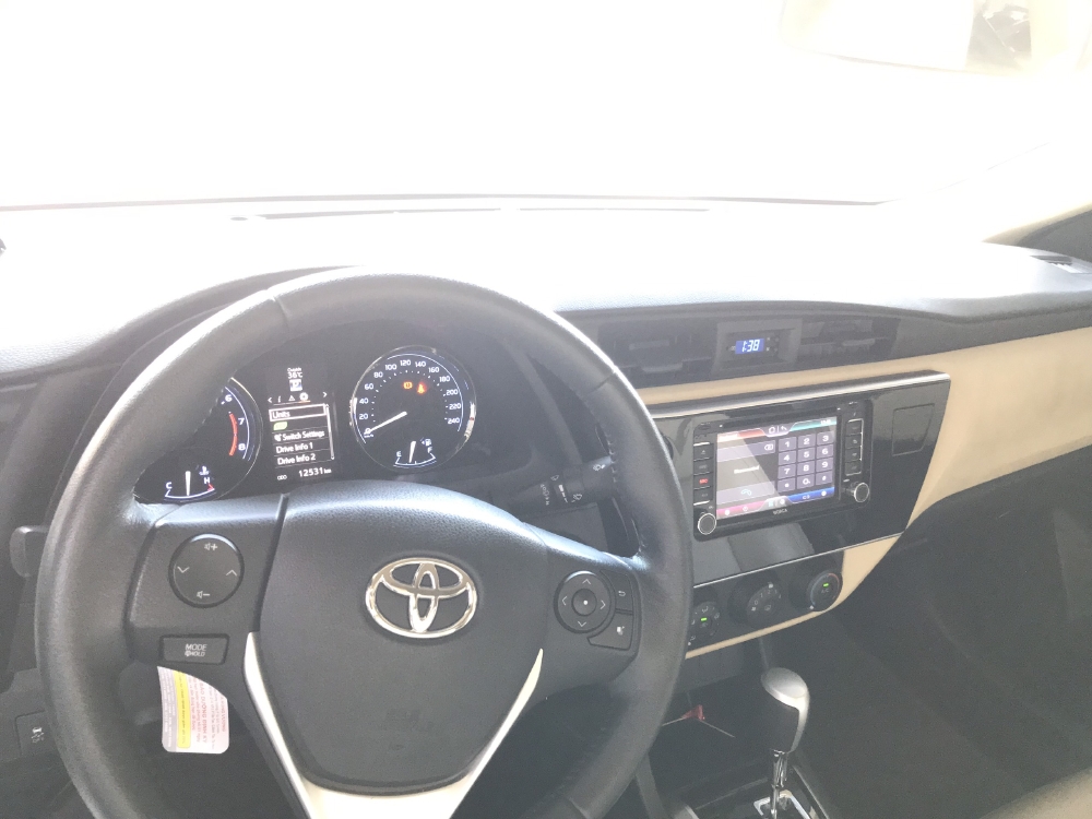 Bán xe Altis 1.8E AT, đời 2018, màu trắng  Odo 12530km , xe đẹp như mới, còn bảo hành chính hãng, có hỗ tợ trả góp