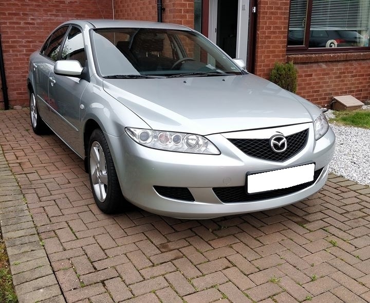 Cần bán xe Mazda 6 số sàn đời 2004 đk 2005 màu bạc
