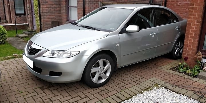 Cần bán xe Mazda 6 số sàn đời 2004 đk 2005 màu bạc