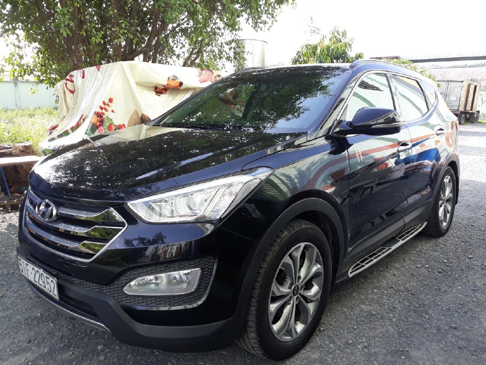 Bán Hyundai SantaFe 4WD 2.4AT màu đen VIP máy xăng bản full 2 cầu số tự động sản xuất 2015 biển Sài Gòn