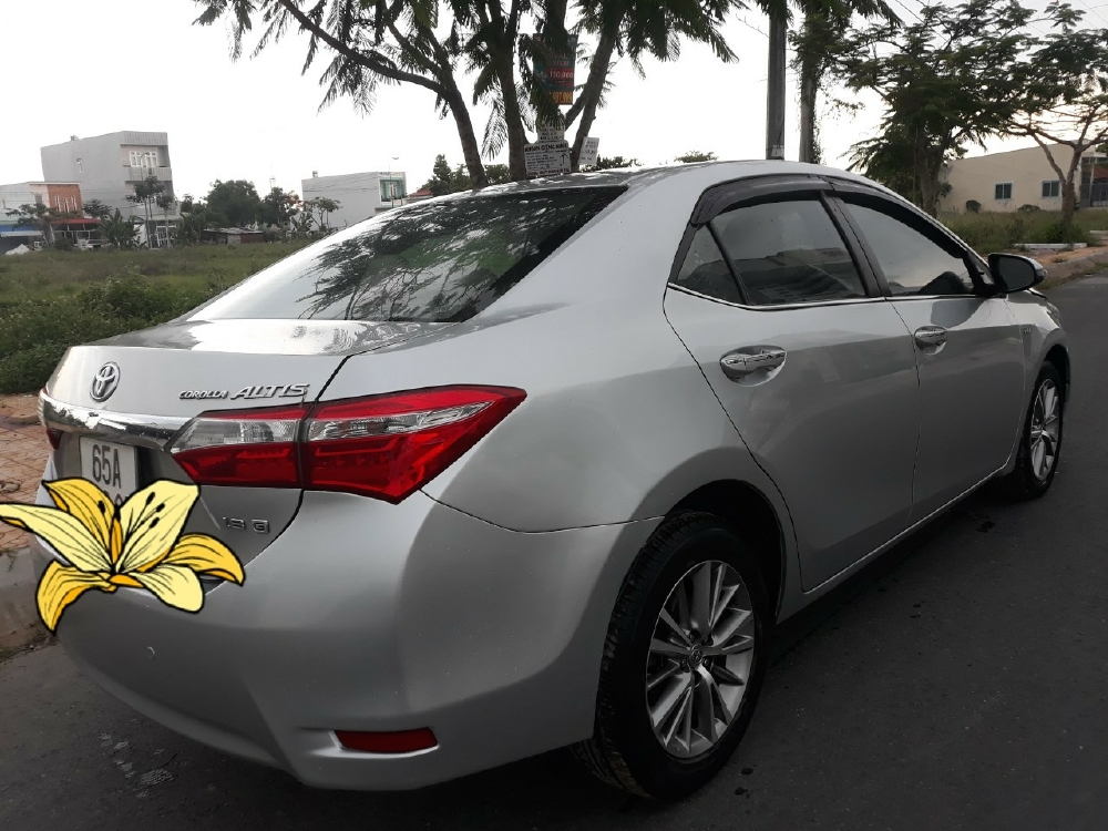 Toyota corolla Altis 1.8MT G 2014 màu bạc