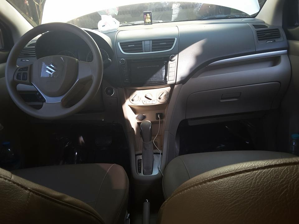 Cần bán xe Eartiga 2016, số tự động, màu trắng, bản full.