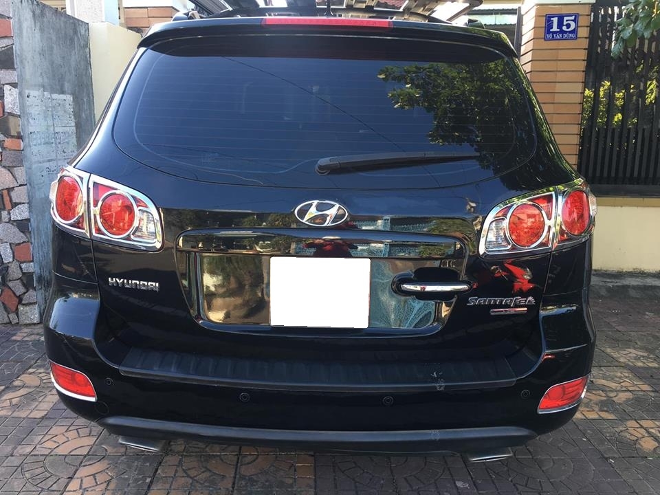 Bán Hyundai Santafe 2009 số sàn màu đen đi đúng 56.000 km rất mới