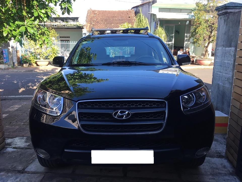 Bán Hyundai Santafe 2009 số sàn màu đen đi đúng 56.000 km rất mới