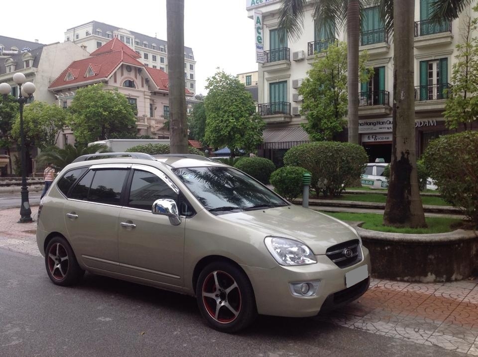 Bán kia carens 2.0 vàng cát 2010 số sàn