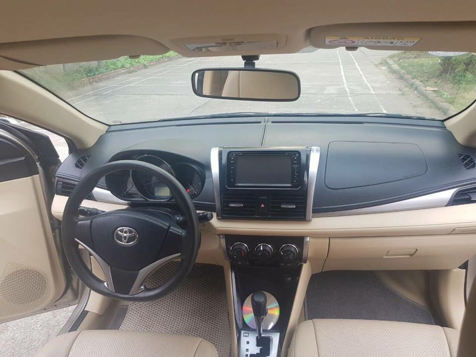 Gia đình cần bán Toyota Vios sx 2016 số tự động màu vàng cát