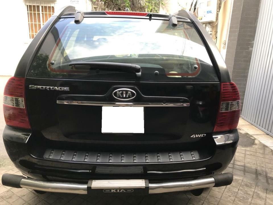 Bán gấp Kia sportage 2006 đk 2007 hai cầu số sàn máy dầu màu đen rất mới