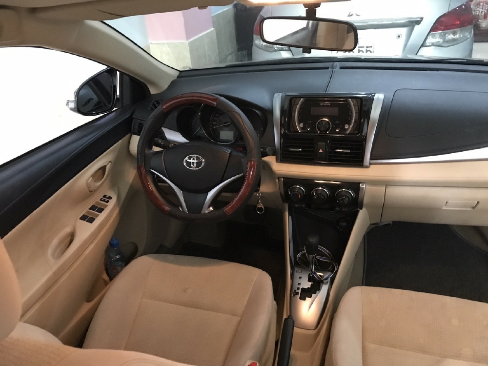 Cần bán xe Toyota Vios 1.5E 2016 số tự động màu vàng cát
