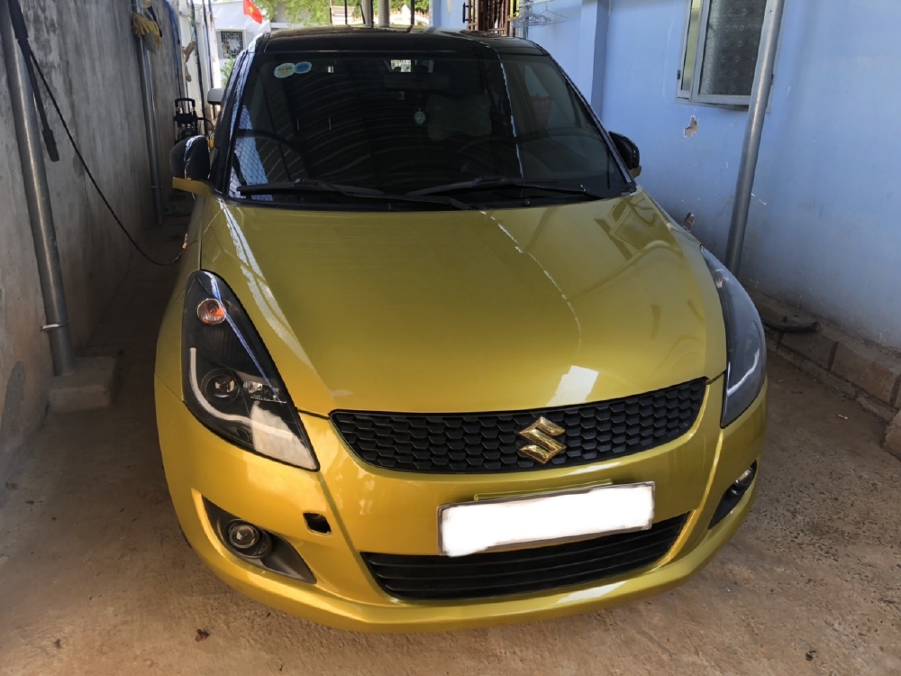 Bán Suzuki Swift RS 2016, màu vàng, đúng chất, giá TL, hổ trợ góp