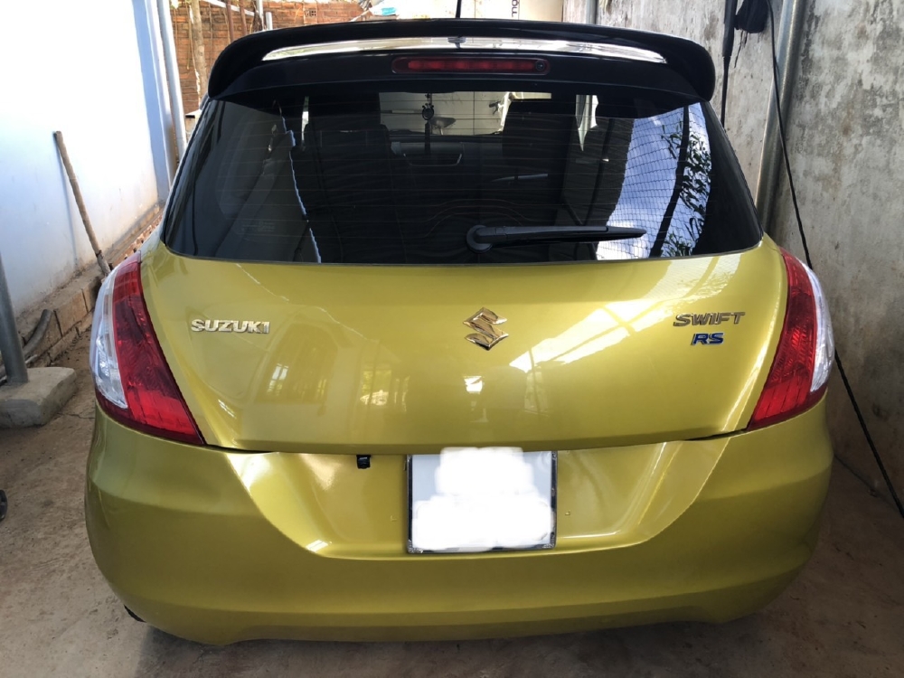 Bán Suzuki Swift RS 2016, màu vàng, đúng chất, giá TL, hổ trợ góp