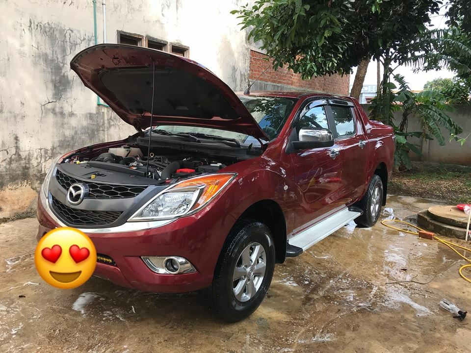 cần bán BT50, sản xuất 2014, số sàn, máy dầu, màu đỏ