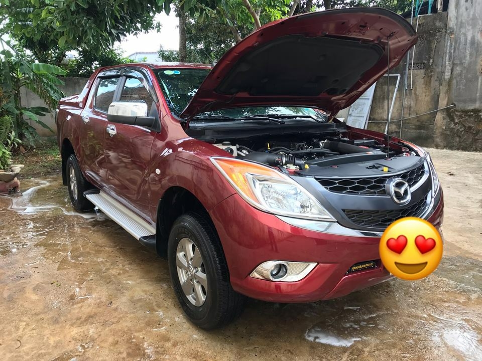 cần bán BT50, sản xuất 2014, số sàn, máy dầu, màu đỏ