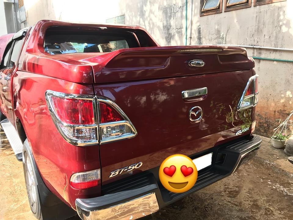cần bán BT50, sản xuất 2014, số sàn, máy dầu, màu đỏ
