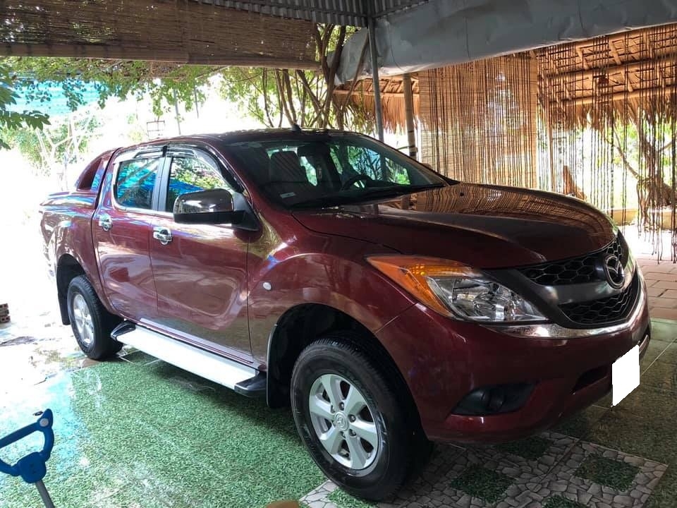 Cần bán xe  Bt50, sản xuất 2013, số sàn, máy dầu, 2 cầu, màu đỏ