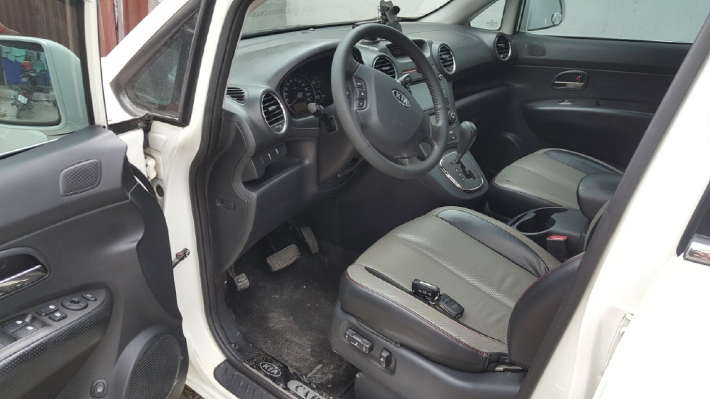 Bán Kia Carens S 2.0AT màu trắng số tự động 7 chỗ sản xuất 2014 một chủ