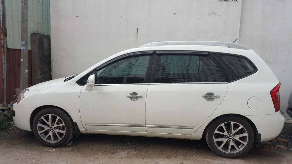 Bán Kia Carens S 2.0AT màu trắng số tự động 7 chỗ sản xuất 2014 một chủ
