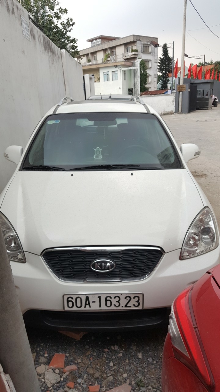 Bán Kia Carens S 2.0AT màu trắng số tự động 7 chỗ sản xuất 2014 một chủ